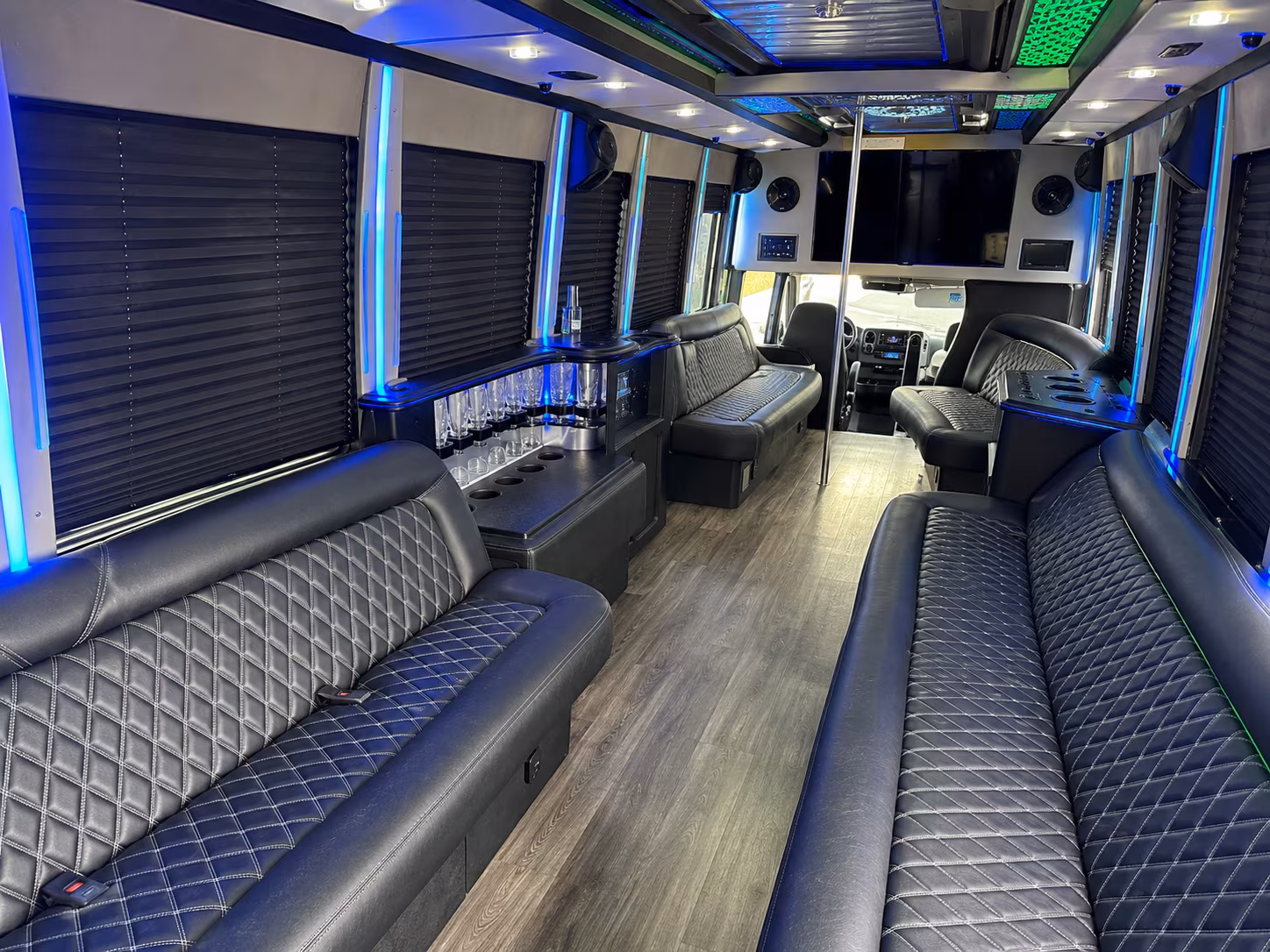 Wedding guests seated inside a party bus serving Jacksonville